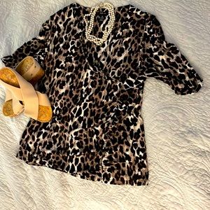 Animal print stretch v-neck blouse in earth tones